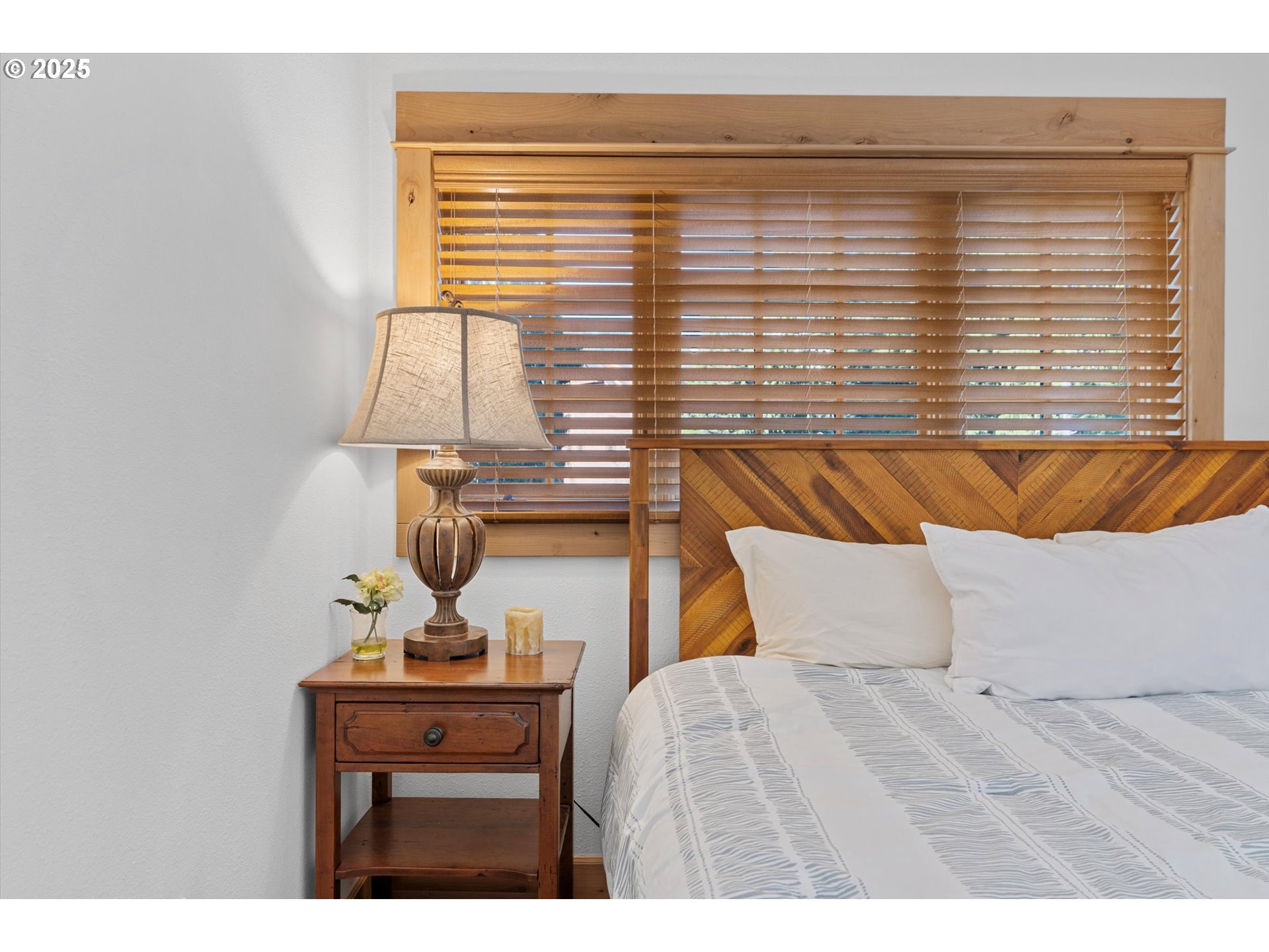 31200 East Collins Lake Road, Unit 1 Government Camp, OR 97028 - Photo 23 of 38 a bedroom with a bed and window