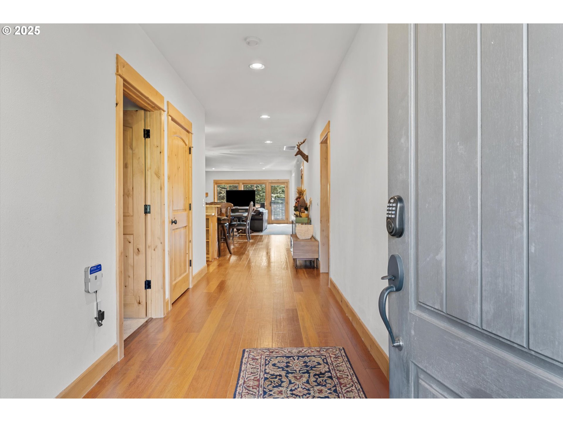 31200 East Collins Lake Road, Unit 1 Government Camp, OR 97028 - Photo 3 of 38 a open kitchen with wooden floor