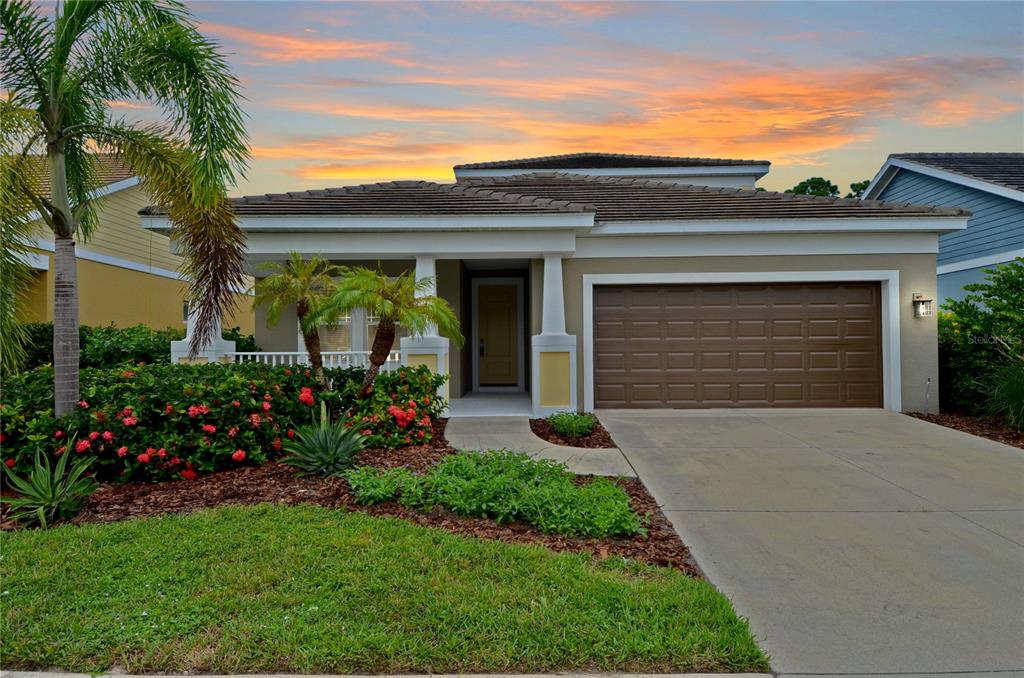 205 Cohosh Road Nokomis, FL 34275 - Photo 3 of 79 front view of house with a yard