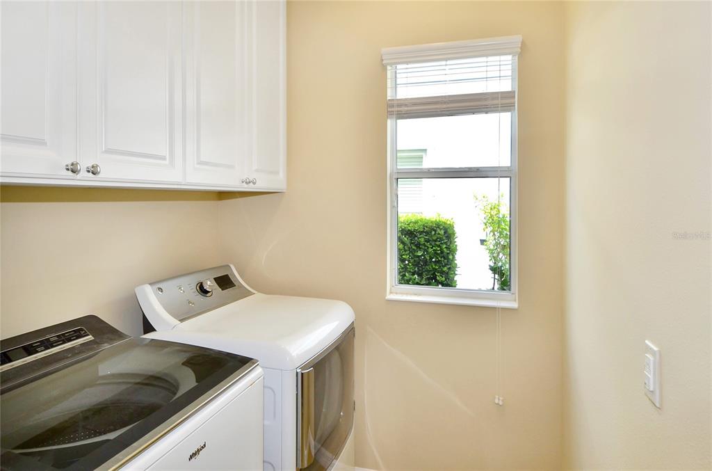 205 Cohosh Road Nokomis, FL 34275 - Photo 33 of 79 a utility room with dryer and washer