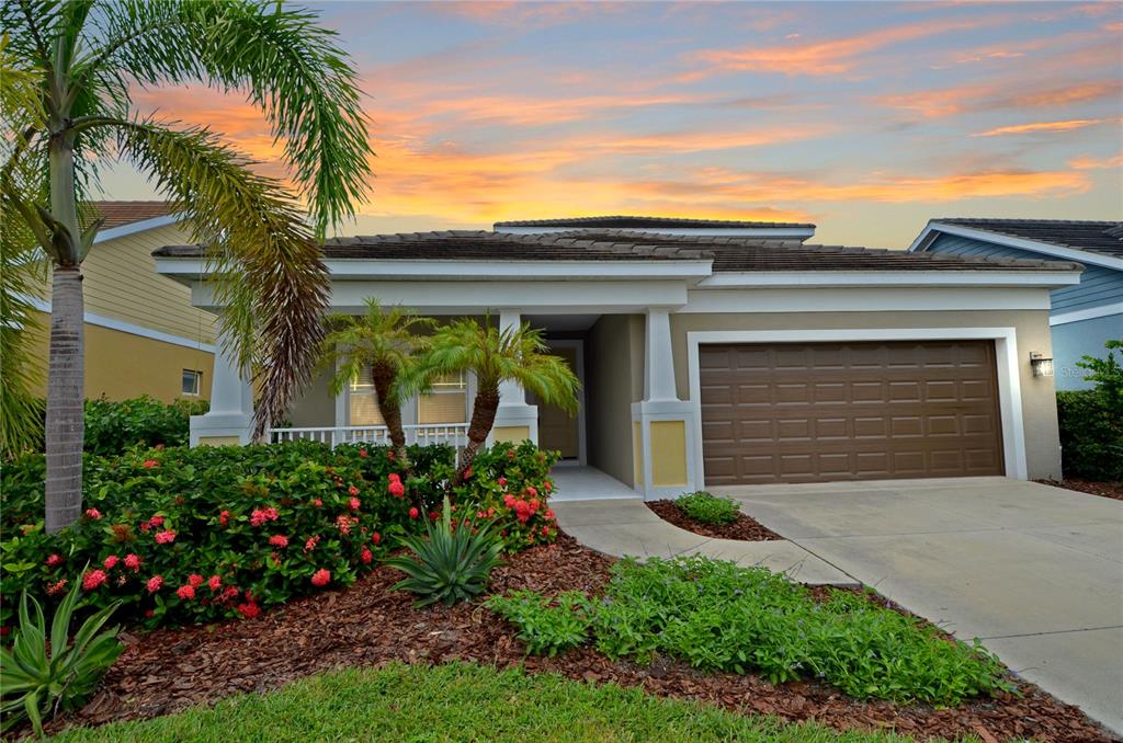 205 Cohosh Road Nokomis, FL 34275 - Photo 37 of 79 front view of a house with a small yard
