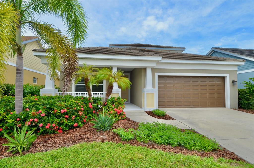 205 Cohosh Road Nokomis, FL 34275 - Photo 51 of 79 a front view of a house with a porch