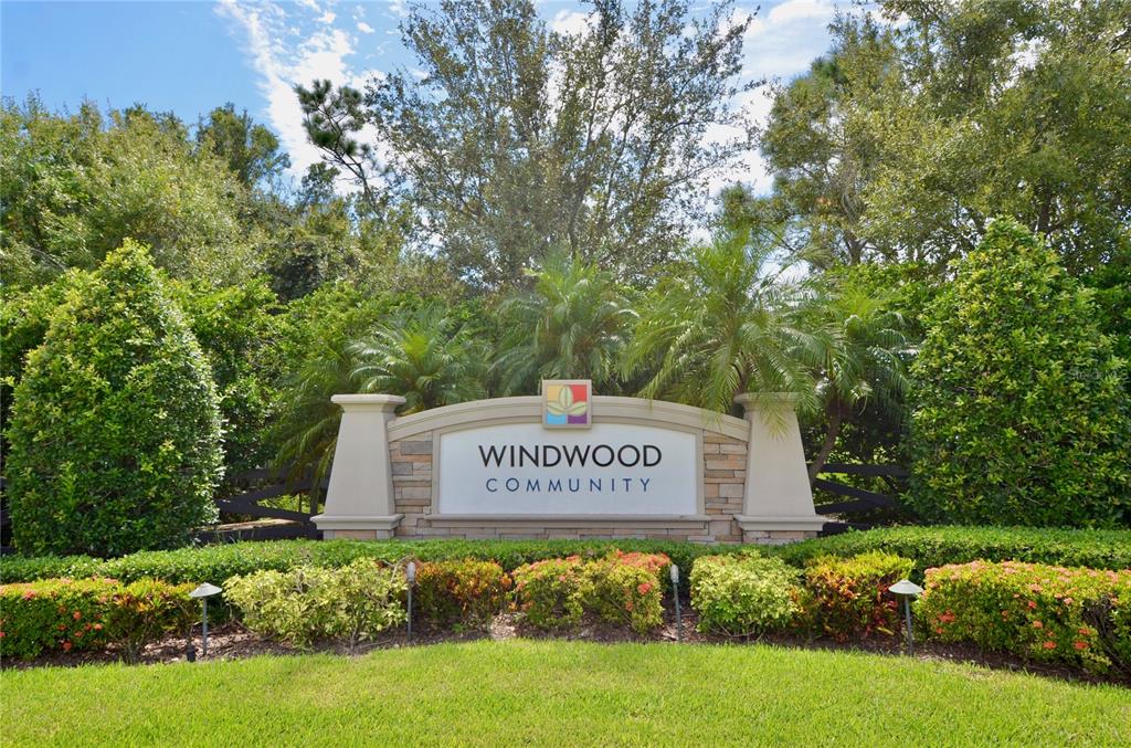 205 Cohosh Road Nokomis, FL 34275 - Photo 59 of 79 a sign of golf club on a wall under a tree