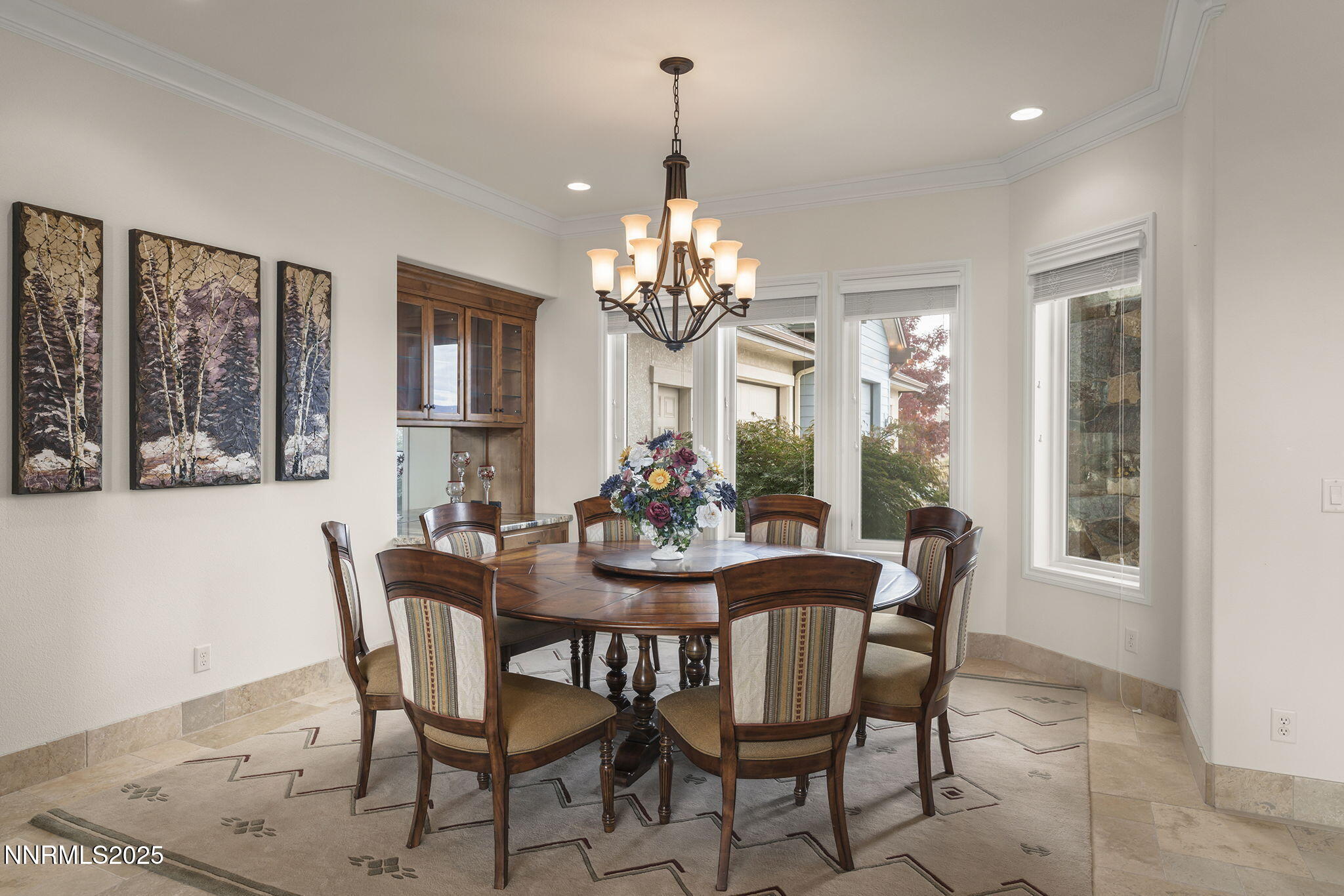 345 James Canyon Loop Genoa, NV 89411 - Photo 18 of 54 a view of a dining room with furniture and window