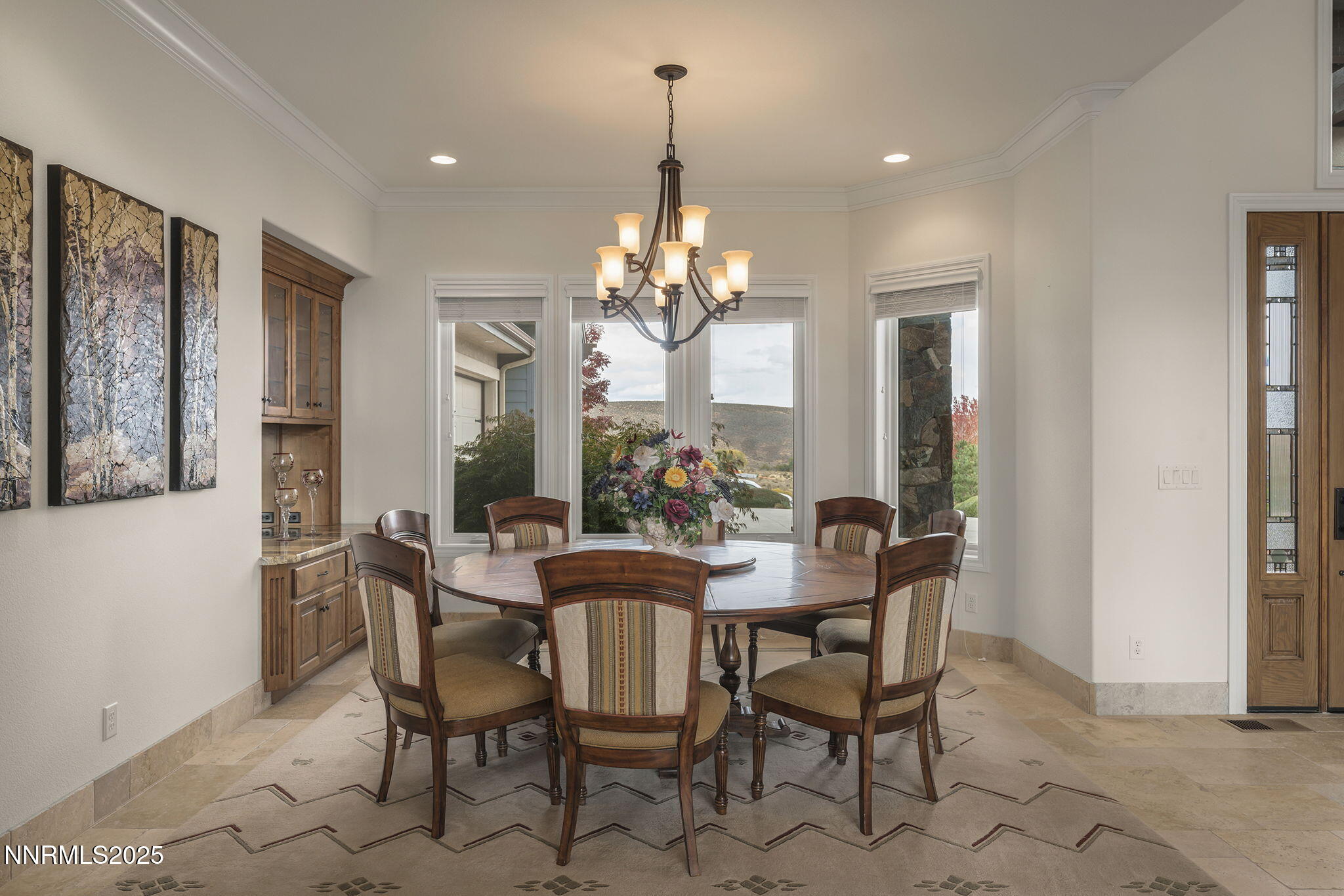 345 James Canyon Loop Genoa, NV 89411 - Photo 19 of 54 a view of a dining room with furniture and window