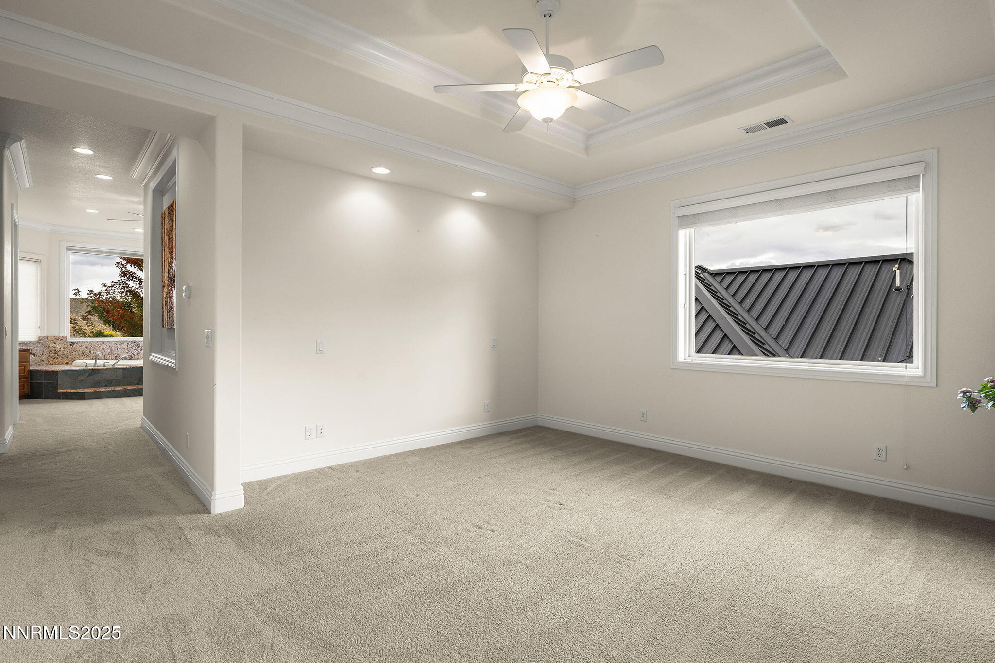 345 James Canyon Loop Genoa, NV 89411 - Photo 21 of 54 a view of an empty room with a window