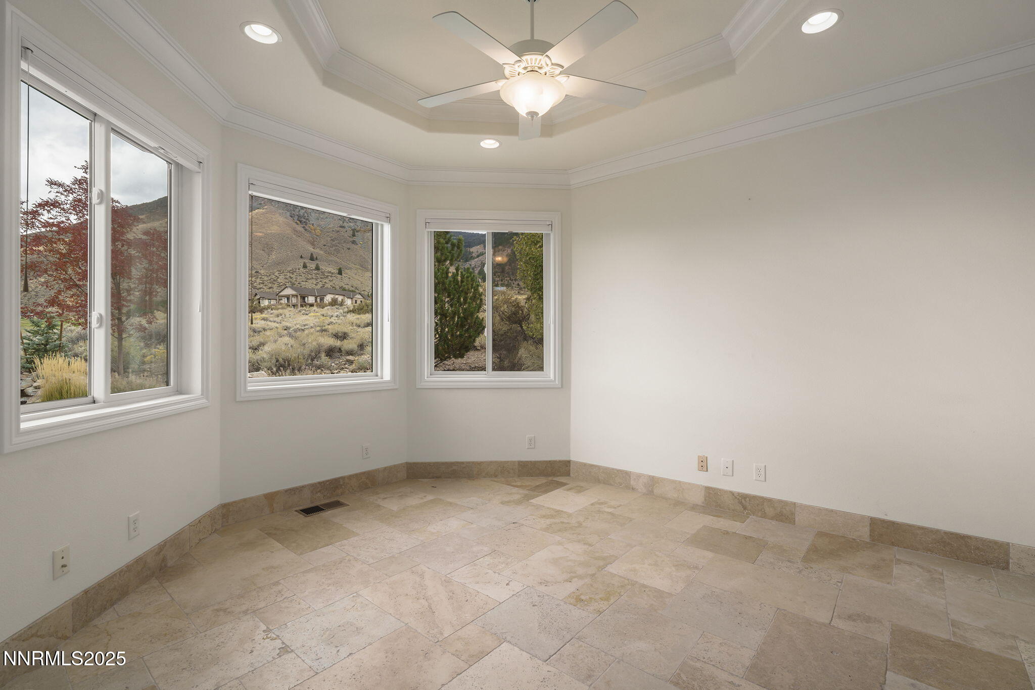 345 James Canyon Loop Genoa, NV 89411 - Photo 26 of 54 a view of an empty room with a window