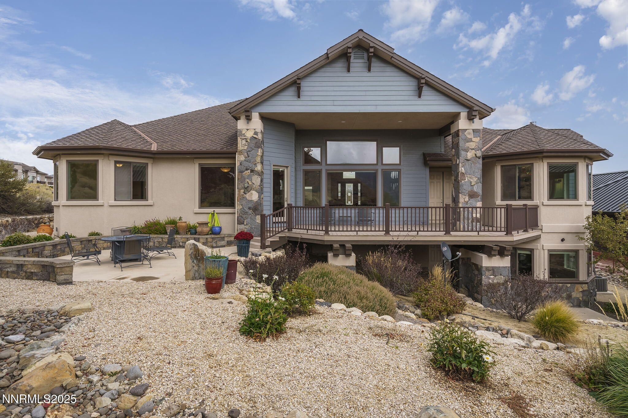 345 James Canyon Loop Genoa, NV 89411 - Photo 47 of 54 a view of a house with swimming pool next to a yard