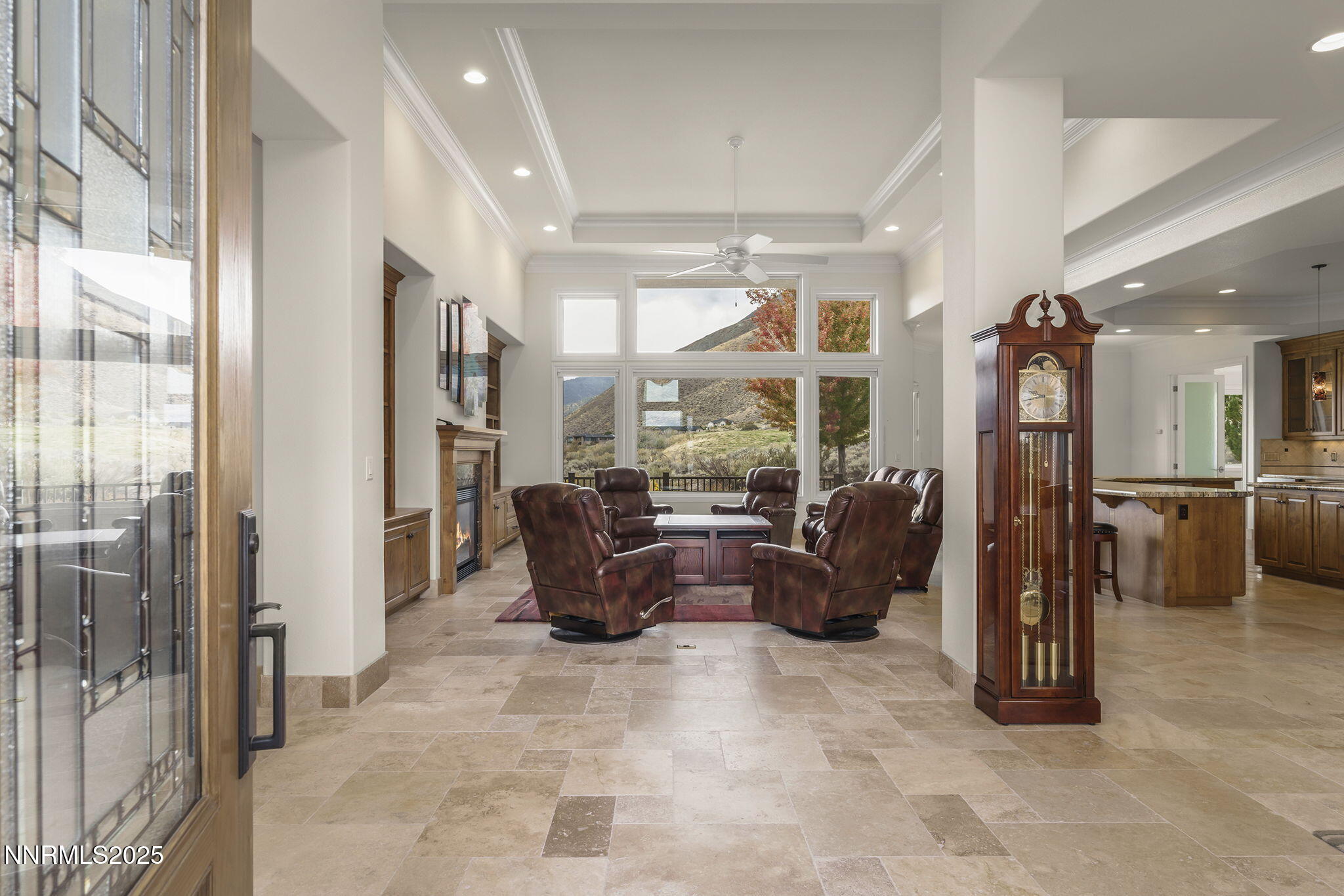 345 James Canyon Loop Genoa, NV 89411 - Photo 5 of 54 a living room with furniture a large window and stainless steel appliances