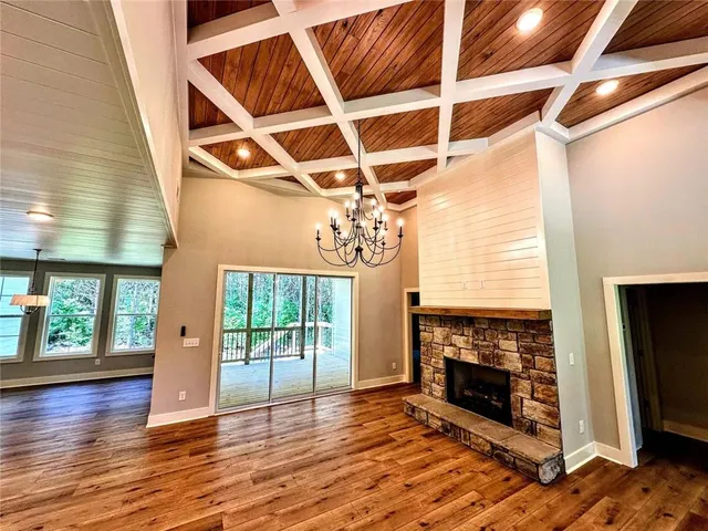 a kitchen with a stove and a fireplace
