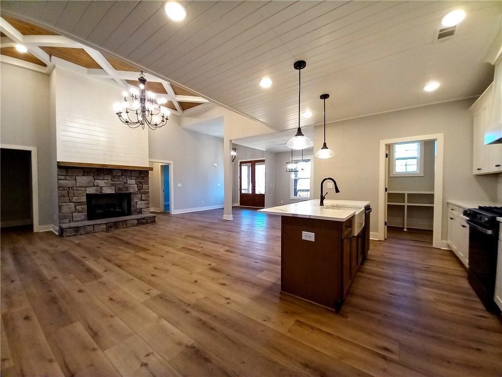 136 Rainey Road Temple, GA 30179 - Photo 35 of 78 a living room with furniture and a fireplace