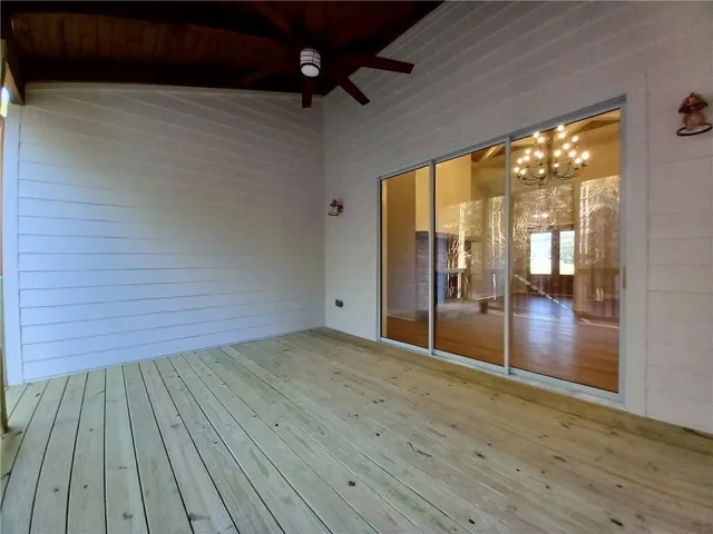 a bathroom with a toilet and a bathtub