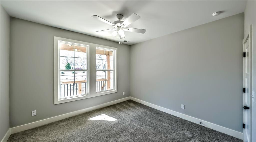 136 Rainey Road Temple, GA 30179 - Photo 61 of 78 a view of an empty room with a window