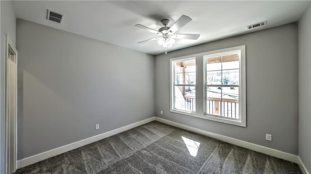 136 Rainey Road Temple, GA 30179 - Photo 62 of 78 a view of an empty room with a window