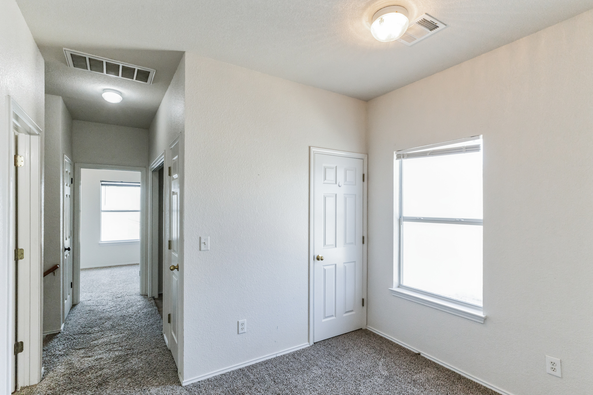 1107 East 3rd Street Georgetown, TX 78626 - Photo 19 of 36 Unfurnished bedroom with carpet flooring