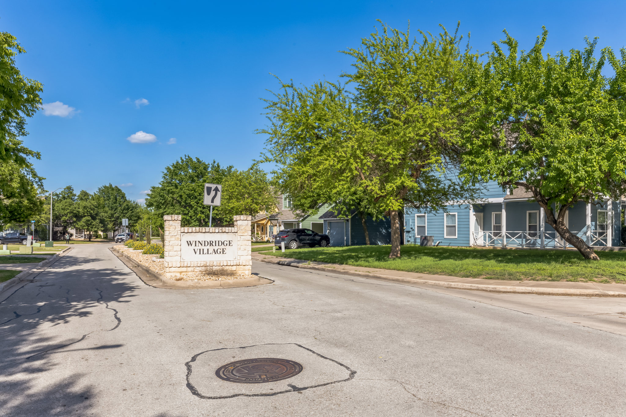1107 East 3rd Street Georgetown, TX 78626 - Photo 26 of 36 View of asphalt street featuring curbs and traffic signs