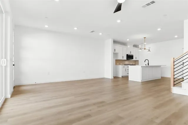 a view of kitchen with wooden floor