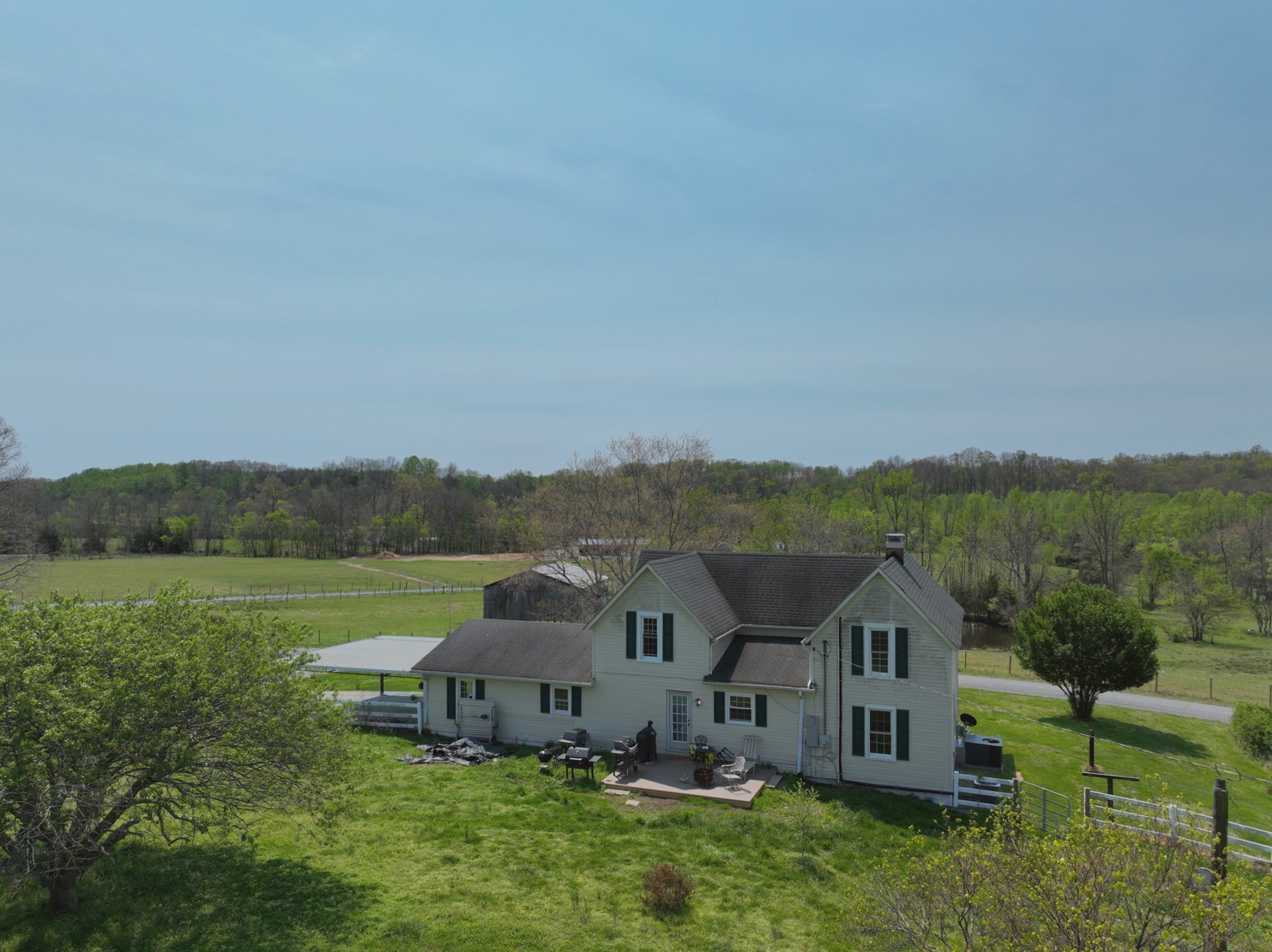 365 Martin Road Portland, TN 37148 - Photo 4 of 12 an aerial view of a house with garden and patio