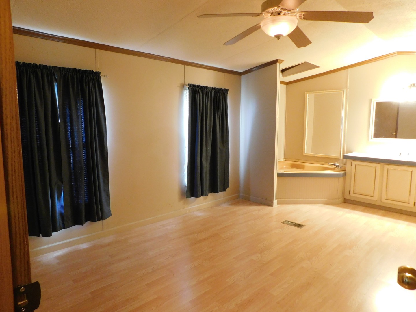69 Apple Lane Bourbonnais, IL 60914 - Photo 6 of 11 a view of an empty room with wooden floor and a window