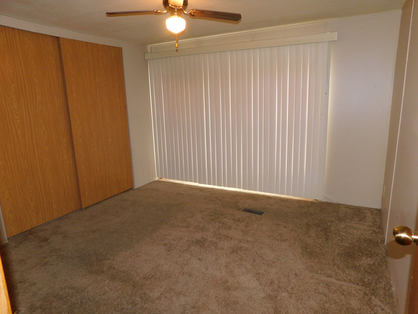 69 Apple Lane Bourbonnais, IL 60914 - Photo 8 of 11 a view of an empty room with a window