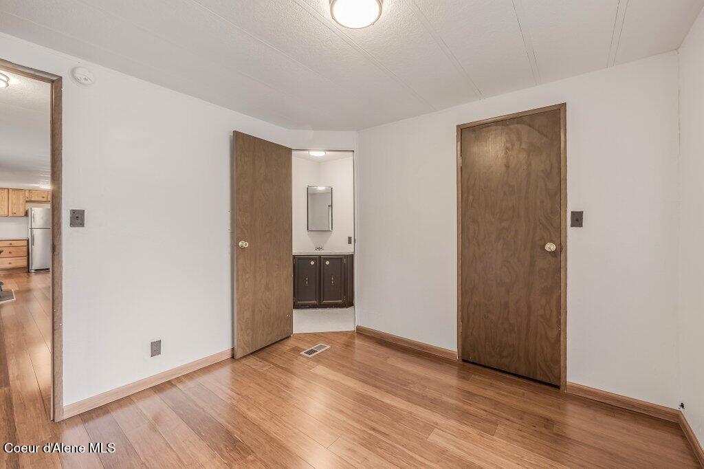 7331 Apache Street Bonners Ferry, ID 83805 - Photo 17 of 23 2nd Bedroom with bathroom