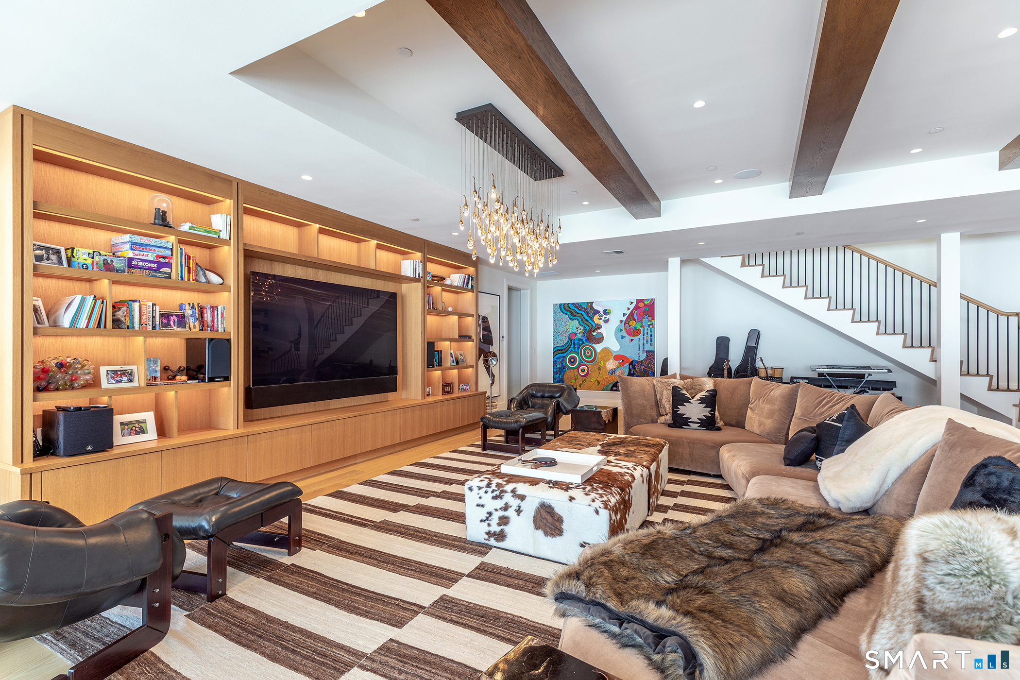 292 Wood Duck Road Amenia, NY 12501 - Photo 11 of 30 a living room with furniture and a flat screen tv