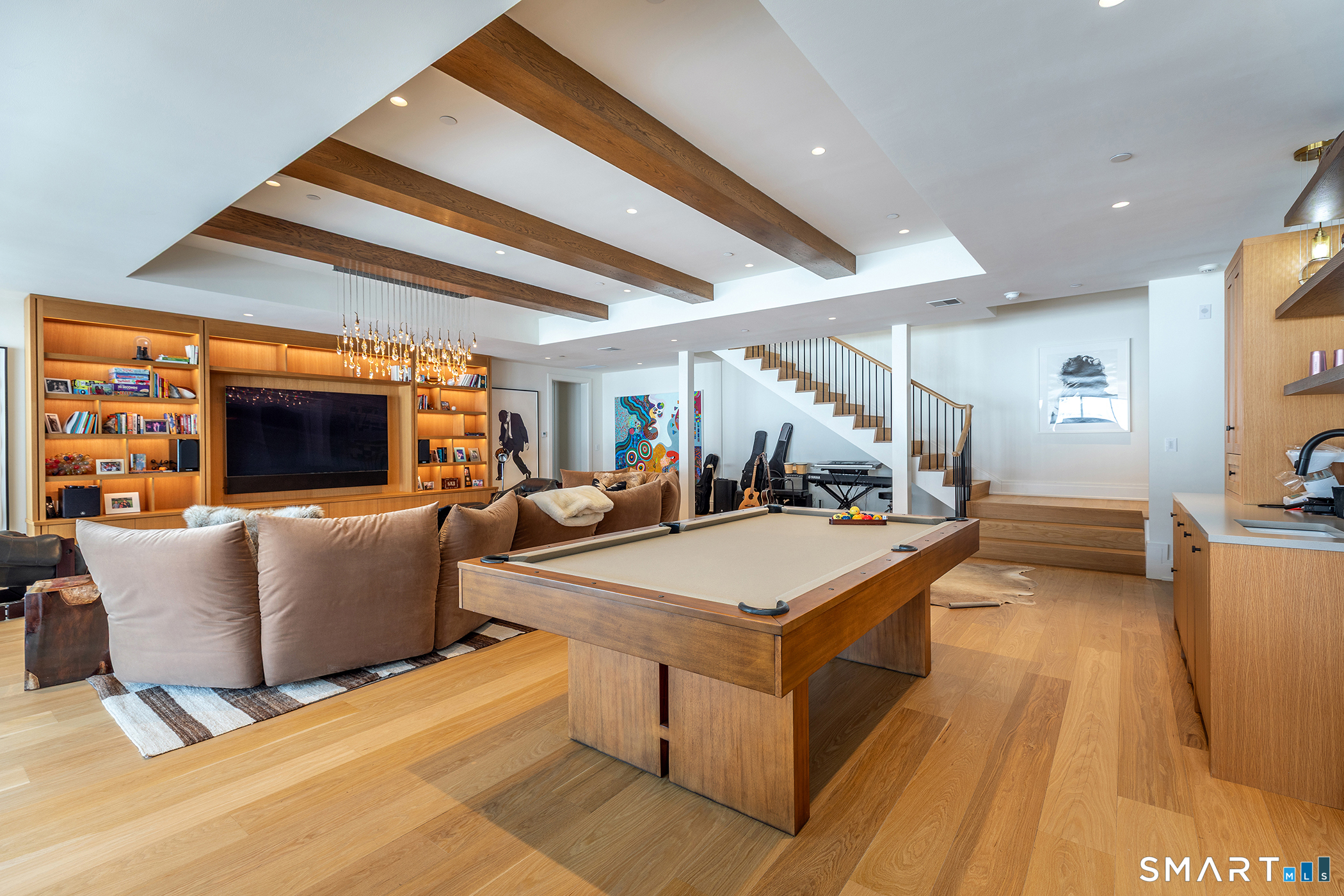 292 Wood Duck Road Amenia, NY 12501 - Photo 12 of 30 a living room with furniture a flat screen tv and a table