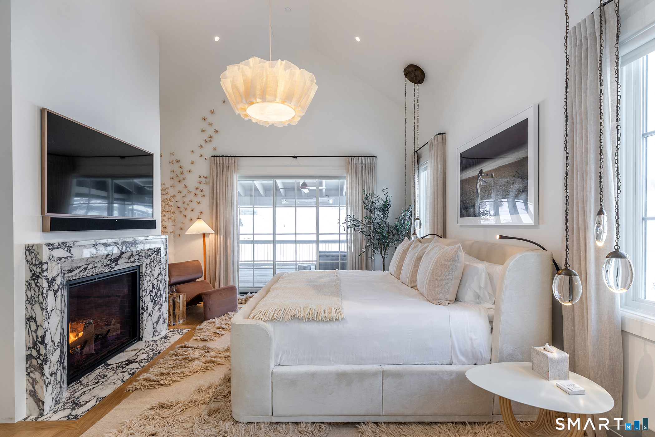 292 Wood Duck Road Amenia, NY 12501 - Photo 17 of 30 a bedroom with a bed and a fireplace