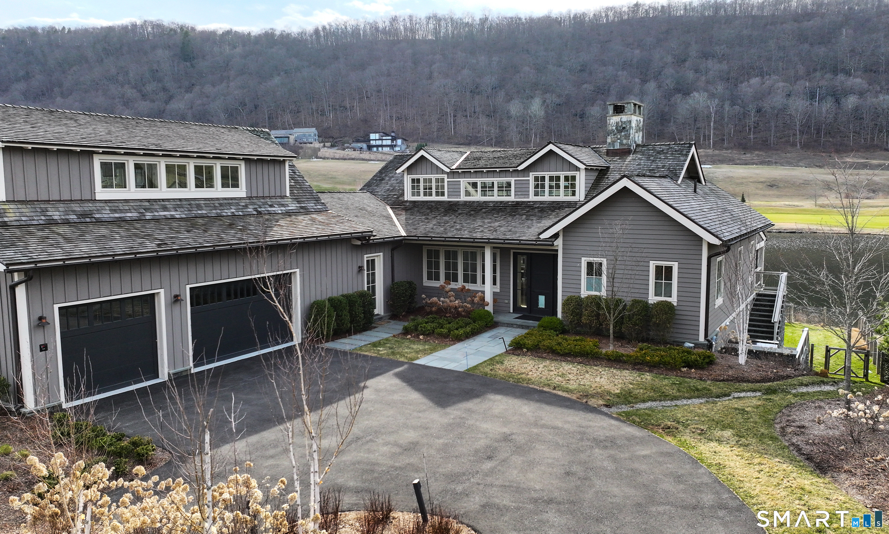 292 Wood Duck Road Amenia, NY 12501 - Photo 33 of 39 a front view of a house with garden