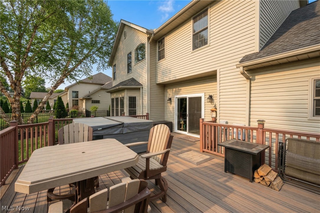 806 Forrest Ridge Drive Dover, OH 44622 - Photo 6 of 36 Wooden deck with outdoor dining space