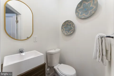 a bathroom with a toilet and a sink