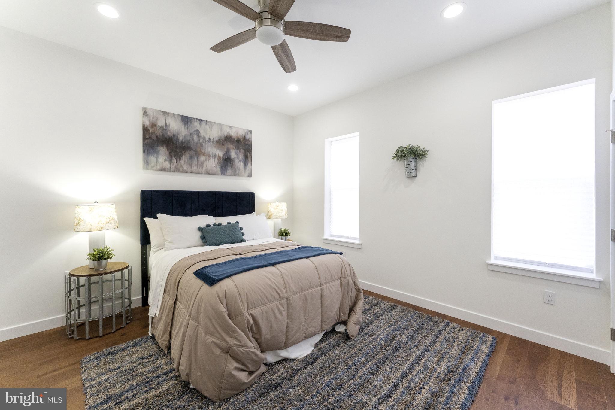 2030 Tasker Street Philadelphia, PA 19145 - Photo 17 of 29 a bedroom with a bed and a window