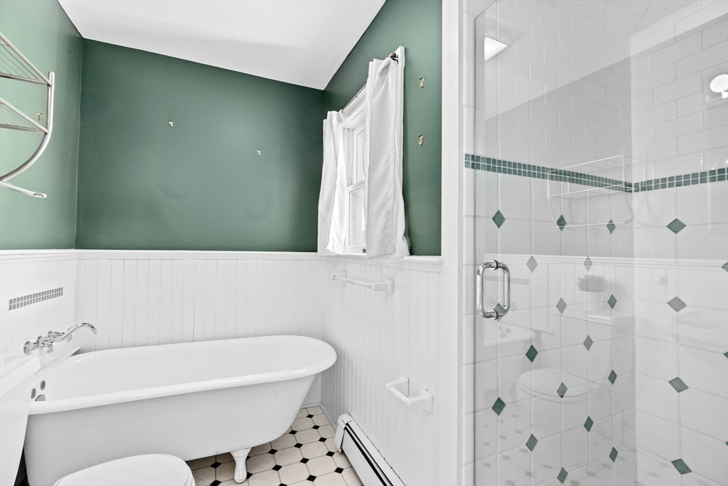 50 Collier Road Scituate, MA 02066 - Photo 26 of 41 a bathroom with a bathtub and a shower