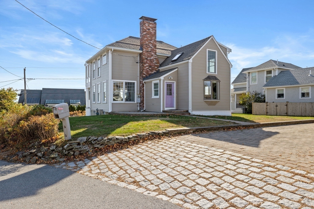 50 Collier Road Scituate, MA 02066 - Photo 34 of 41 a front view of a house with a yard