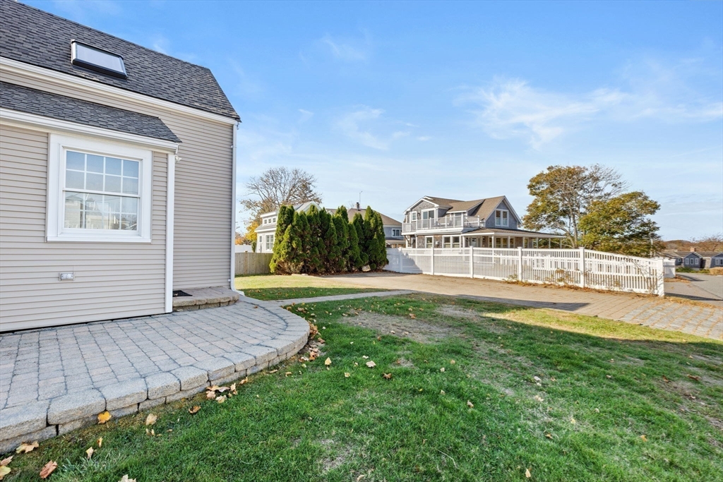 50 Collier Road Scituate, MA 02066 - Photo 35 of 41 a view of a house with backyard and porch
