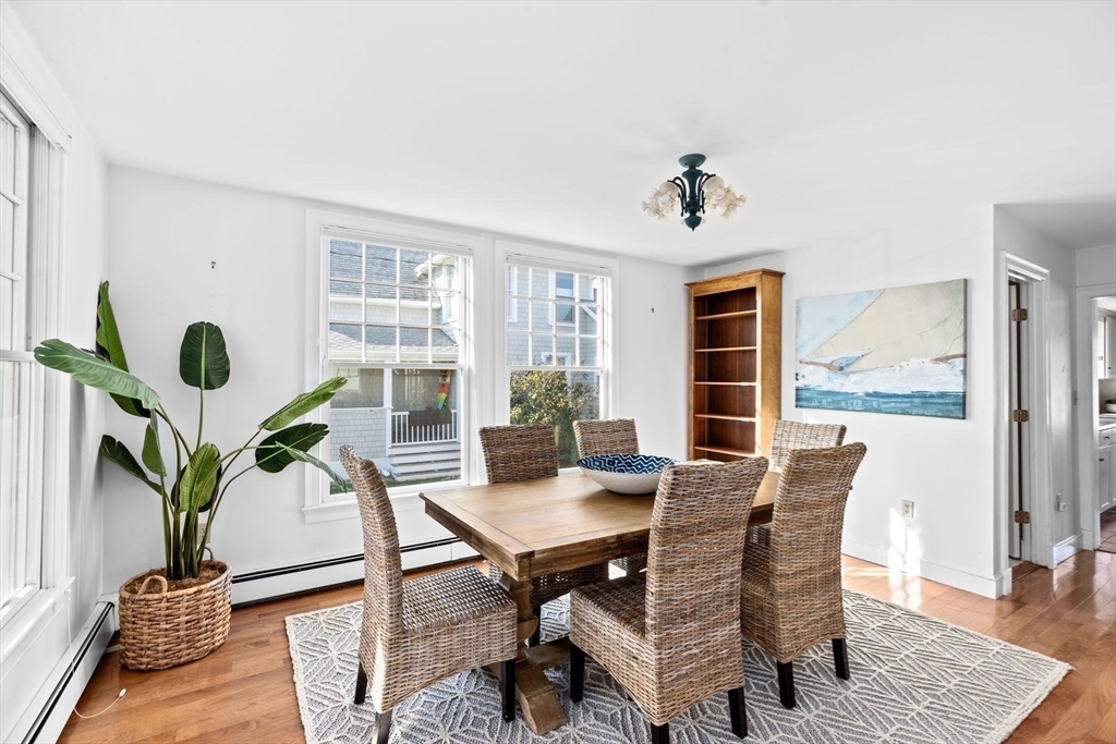 50 Collier Road Scituate, MA 02066 - Photo 4 of 41 a view of a dining room with furniture window and wooden floor