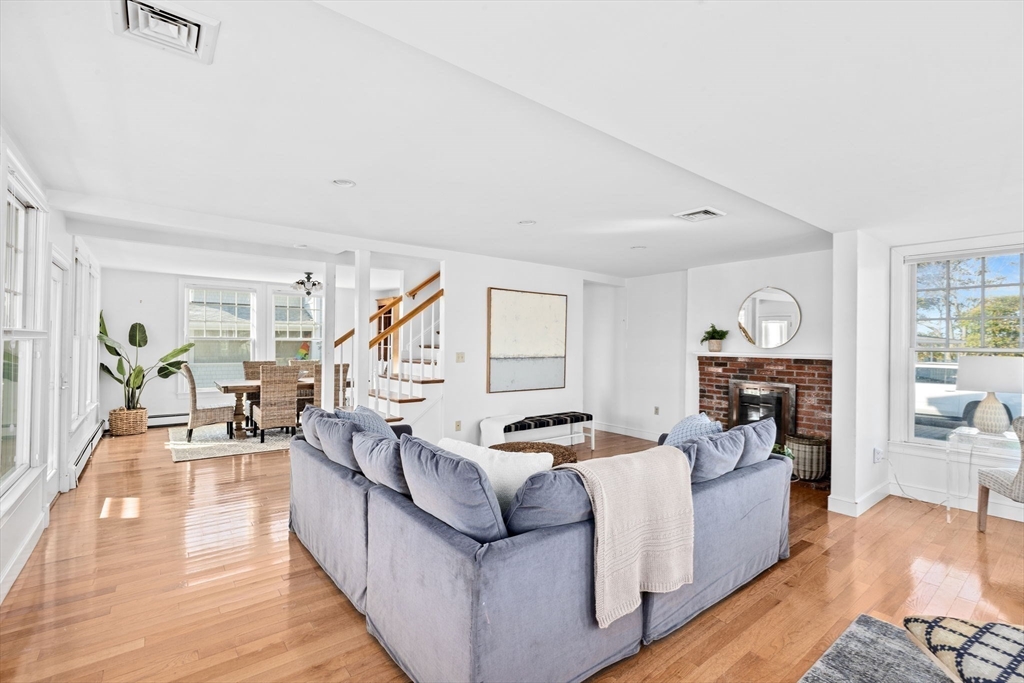 50 Collier Road Scituate, MA 02066 - Photo 7 of 41 a living room with furniture and a wooden floor