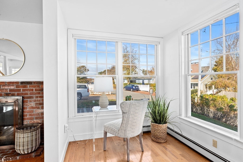 50 Collier Road Scituate, MA 02066 - Photo 8 of 41 a living room with furniture and wooden floor