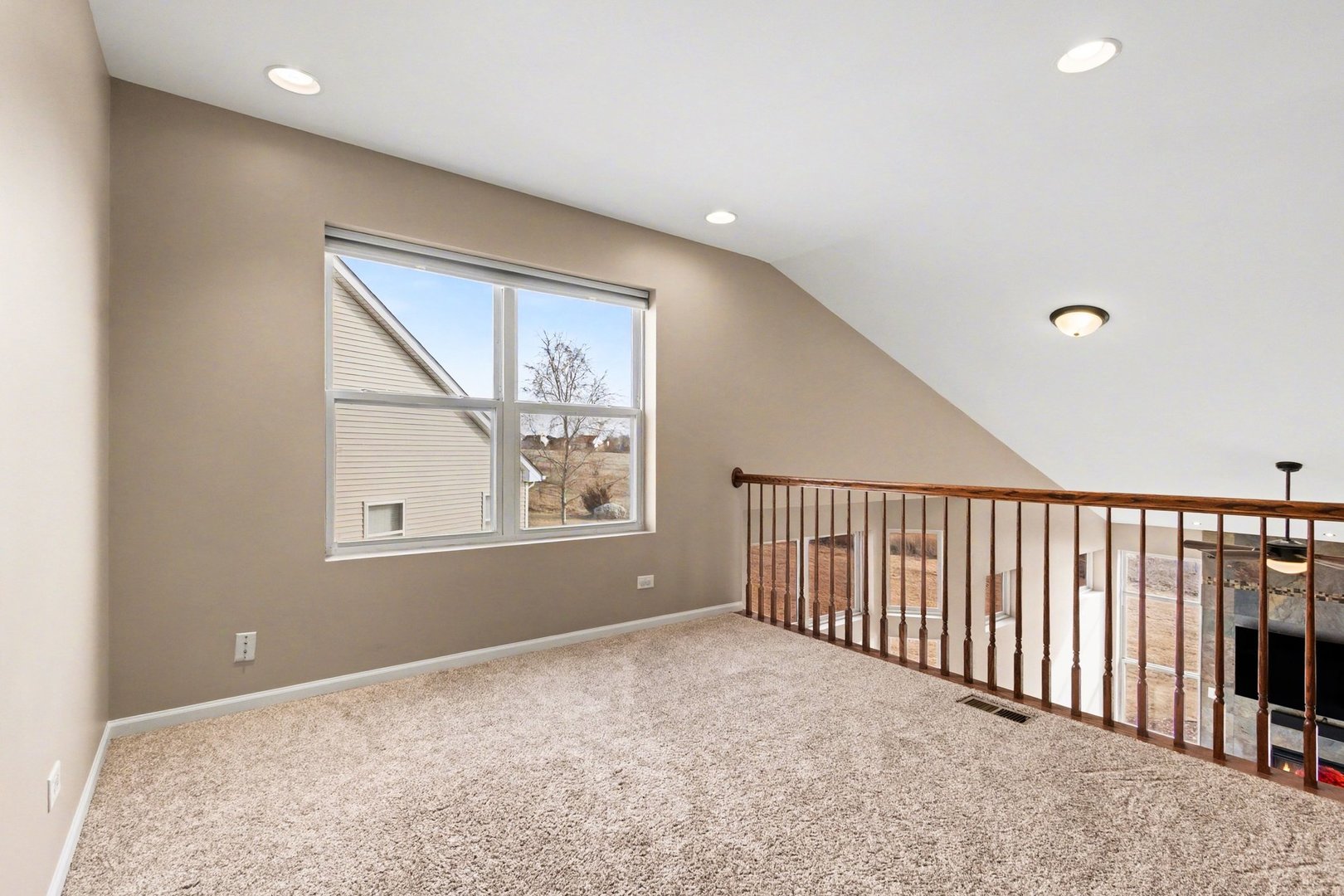 906 Bluebell Circle Joliet, IL 60431 - Photo 11 of 18 a view of an empty room with a window