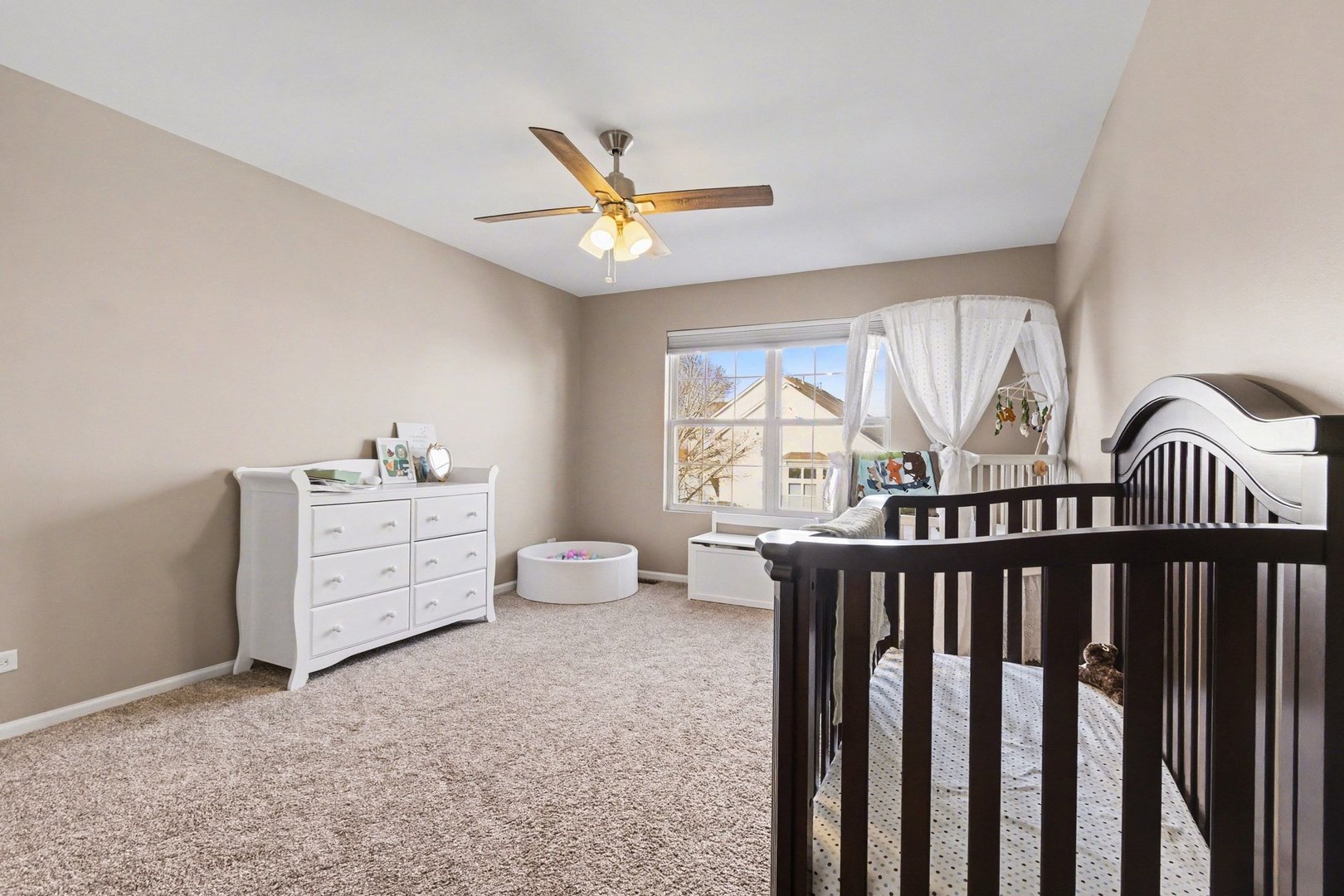 906 Bluebell Circle Joliet, IL 60431 - Photo 14 of 18 a bedroom with furniture and a window