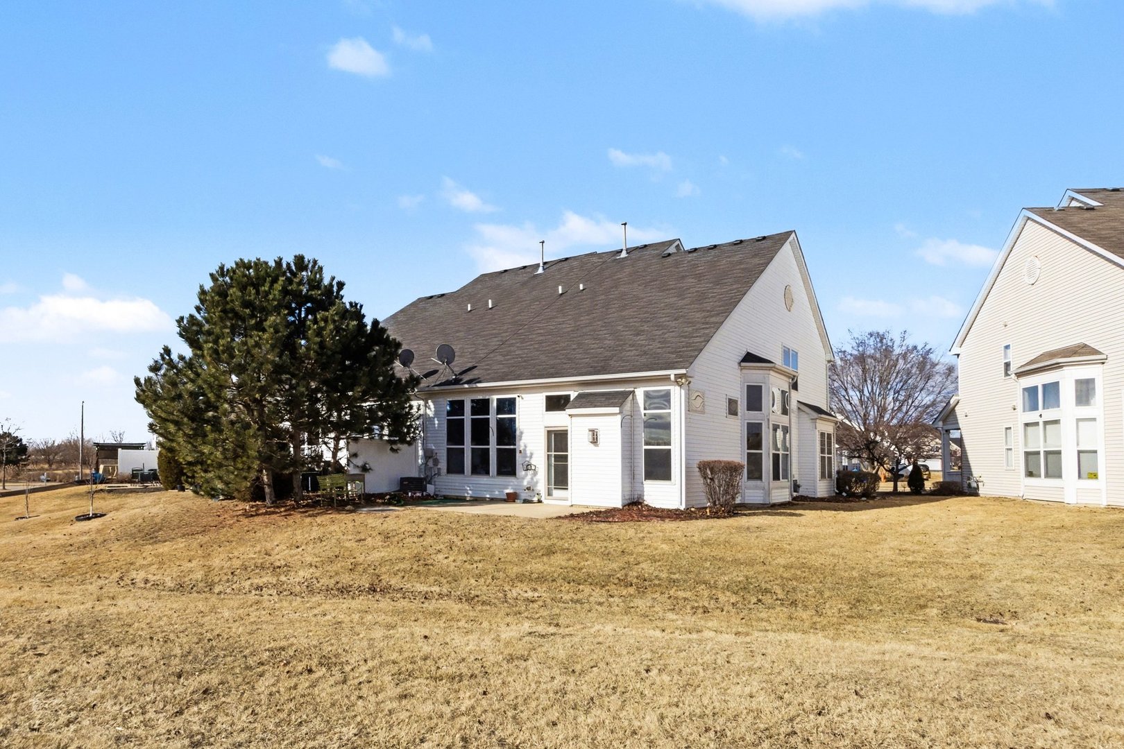 906 Bluebell Circle Joliet, IL 60431 - Photo 15 of 18 a front view of a house with a yard