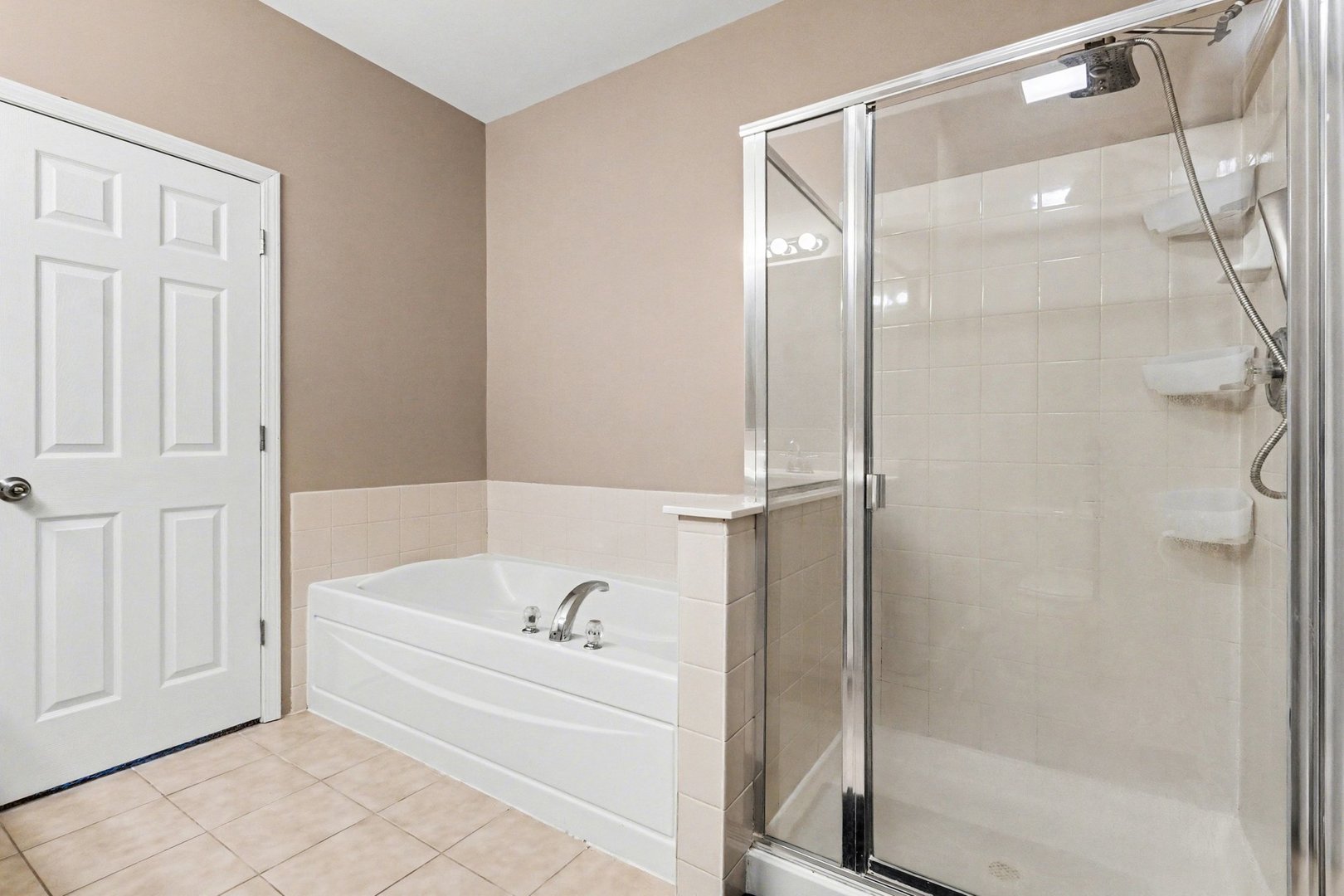 906 Bluebell Circle Joliet, IL 60431 - Photo 9 of 18 a bathroom with a bathtub and a shower