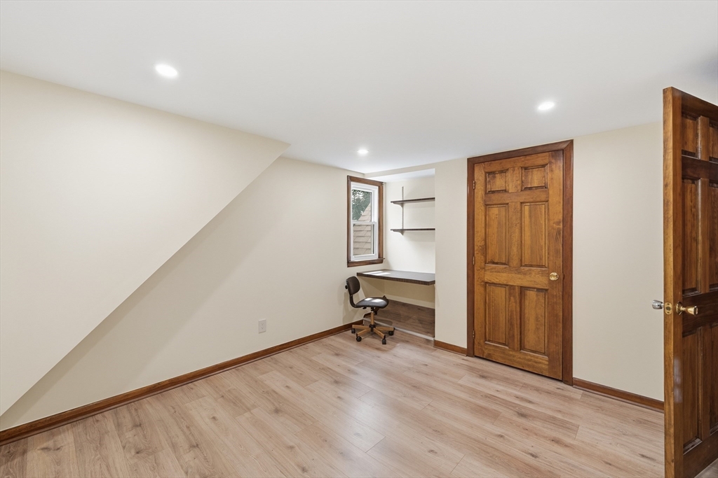 43 Flint Road Tyngsborough, MA 01879 - Photo 21 of 40 wooden floor in an empty room with a window