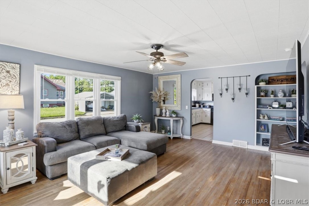 316 North Maple Street Eldon, MO 65026 - Photo 7 of 66 Family Room with original hardwood floors and noti