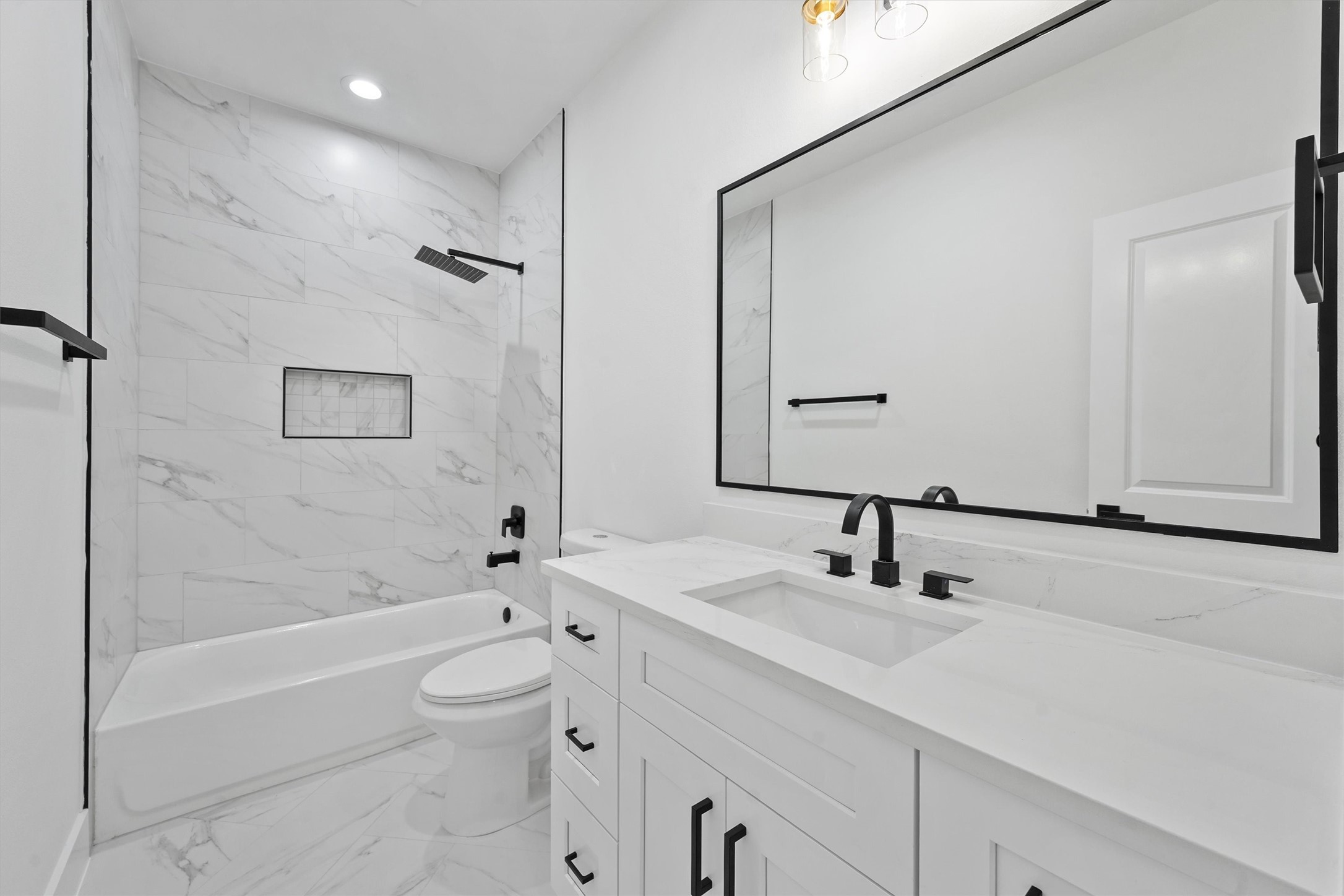 4208 Castor Street, Unit B Houston, TX 77022 - Photo 20 of 23 a bathroom with a bathtub shower sink vanity and toilet