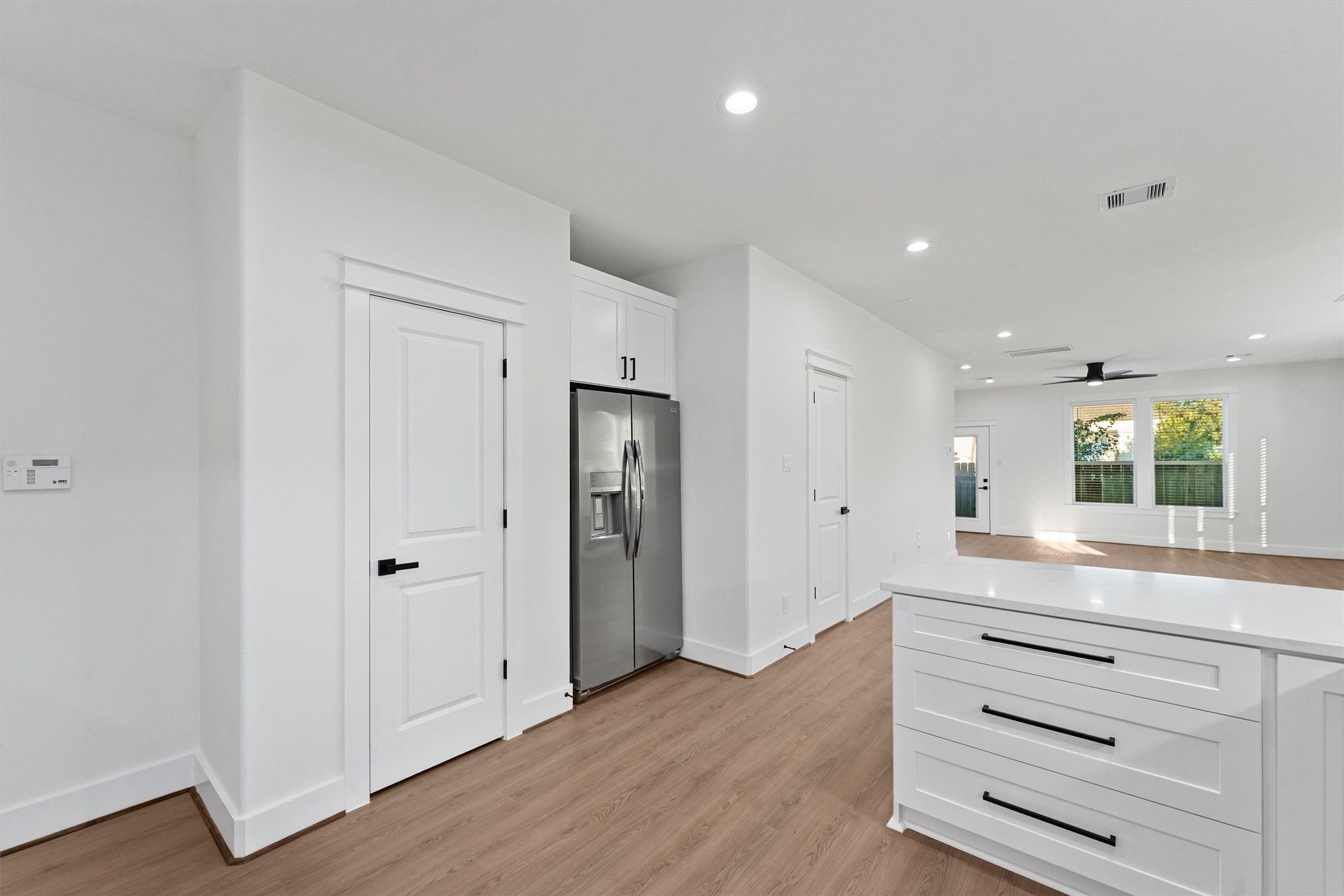 4208 Castor Street, Unit B Houston, TX 77022 - Photo 6 of 23 a view of room with wooden floor and window