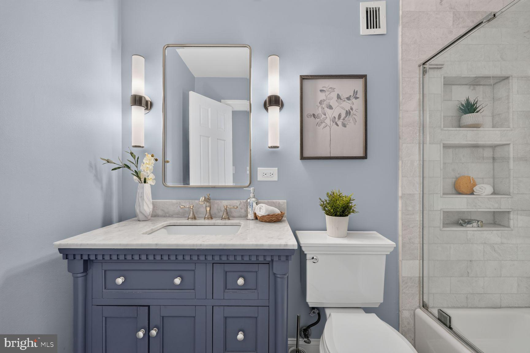 641 11th Street Northeast Washington, DC 20002 - Photo 14 of 22 Charming bathroom with serene hues.