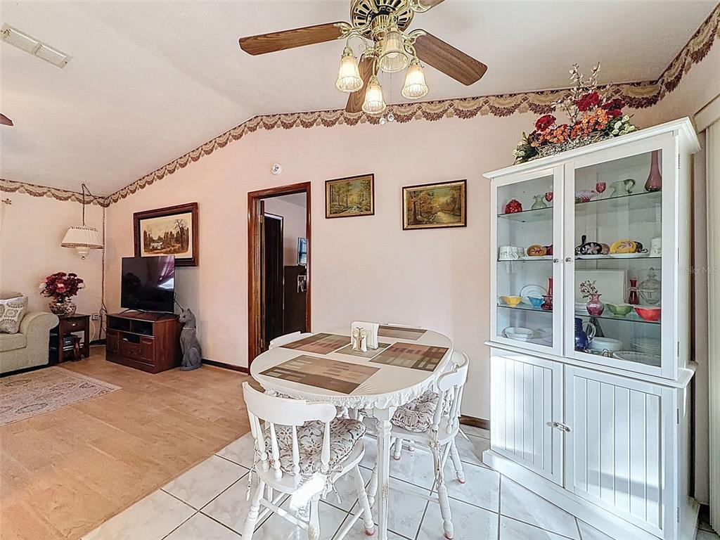 12229 Cedro Street Spring Hill, FL 34609 - Photo 14 of 50 a view of a livingroom with furniture and window