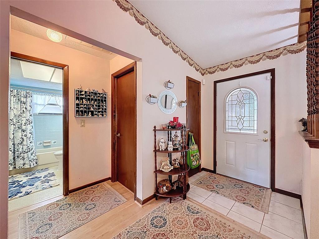 12229 Cedro Street Spring Hill, FL 34609 - Photo 27 of 50 a view of an entryway with a livingroom