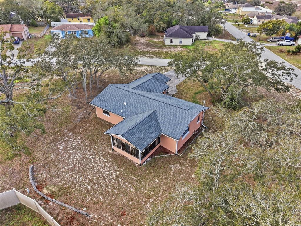 12229 Cedro Street Spring Hill, FL 34609 - Photo 3 of 50 an aerial view of residential house with outdoor space